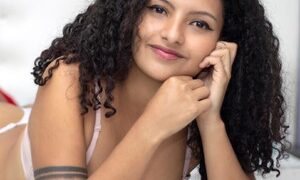 CurlyAlicia naked before webcam in live video chat